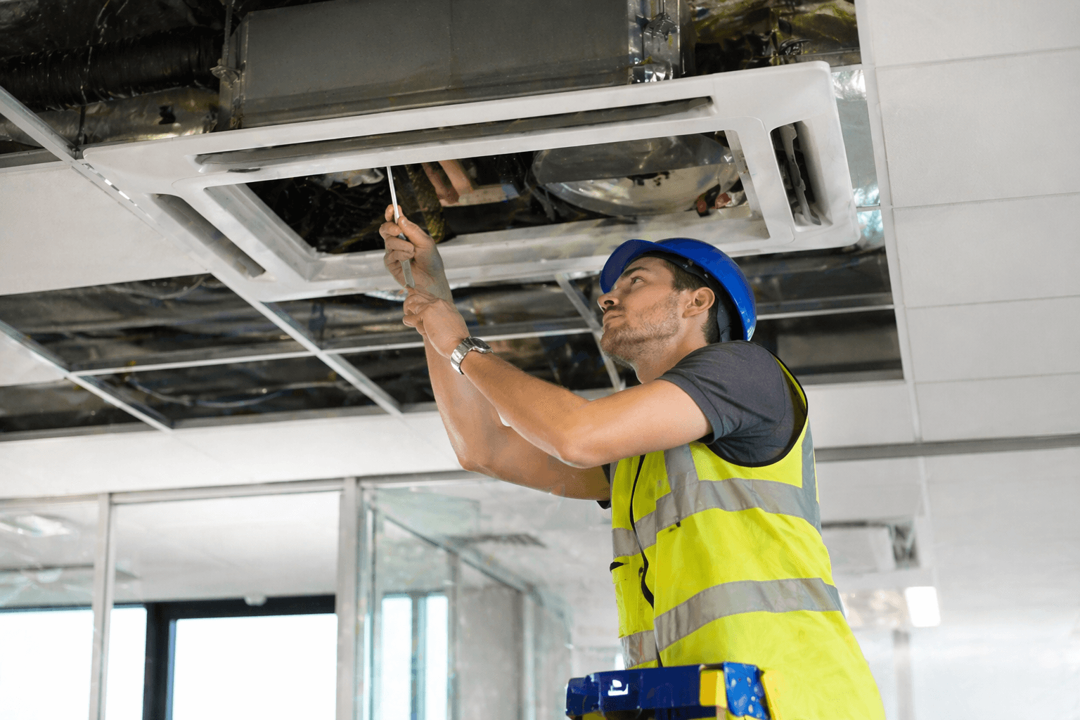 HVAC technician servicing residential equipment